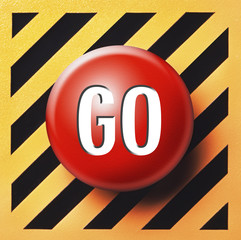 Red go button on yellow and black panel