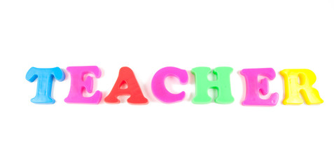 teacher written in fridge magnets on white background