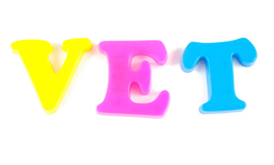 vet written in fridge magnets on white background