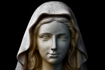 Foto op Canvas Holy Mary statue portrait isolated on black © Minerva Studio