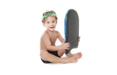 cute boy with swimming board over white