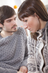 unhappy couple at home