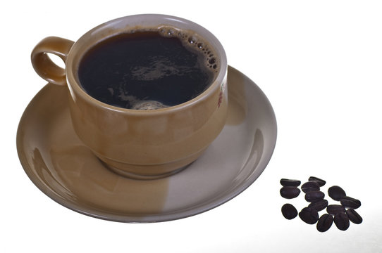 cup of coffee and coffe beans