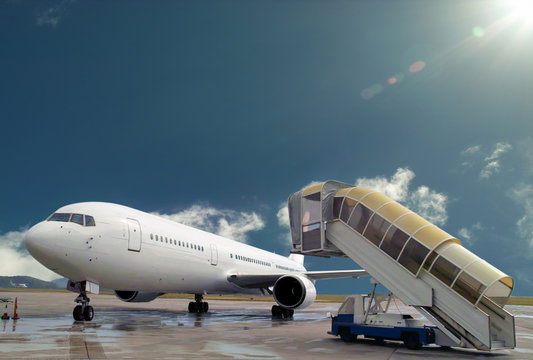 Airplane, Boarding Ladder On Sunshining Airport.