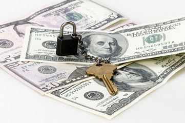 Candado con llave y d&oacute;lares