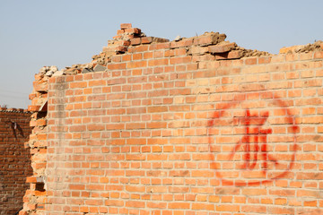 demolition of smoldering rubble