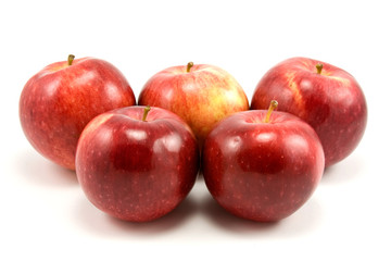 group of red apples on white background