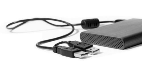 Metallic portable gigabytes harddrive isolated on white