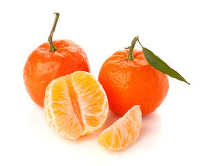 Ripe tangerines with green leaf