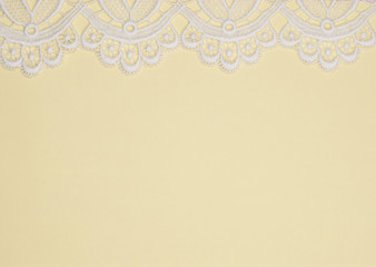 Yellow background with  lace