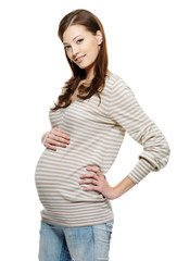 Pregnant woman in casual clothes isolated