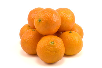 pile of fresh tangerines on white background