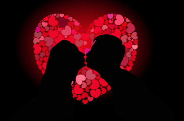 Silhouettes of lovers kissing