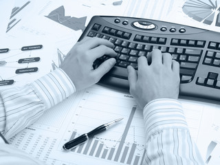 Man's hands on the keyboard