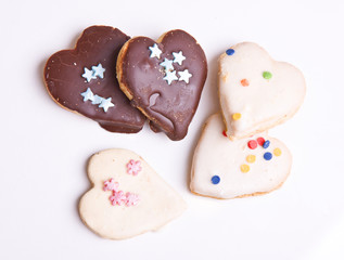 chocolate cookies in the shape of a heart isolated on white