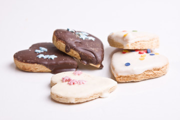 chocolate cookies in the shape of a heart isolated on white