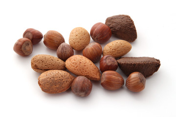 Mixed nuts on a plain white background.