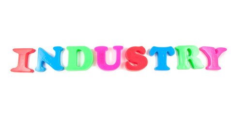 industry written in fridge magnets on white background