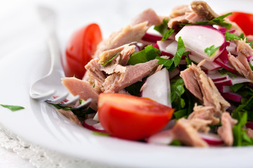 Tuna salad with radish and fresh parsley