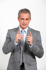 Businessman presenting project looking at camera