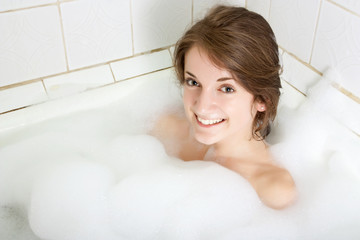 girl sitting in a bath