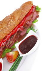 baguette with smoked sausage with sauces