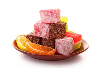 colorful candies jelly on yellow background