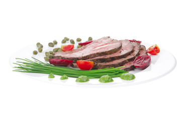 roasted meat served on white dish
