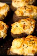 Double stuffed potatoes with chives on top
