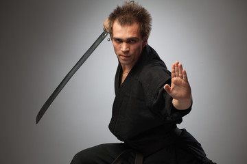 Fighter ninja with sword © featherlab