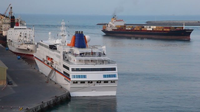 cruise ships and cargo barges in seaport in Abu Dhabi, UAE