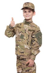 Saluting soldier. Young boy
