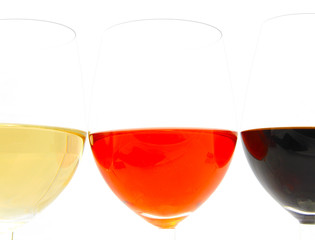 three wine glasses of white and red vine