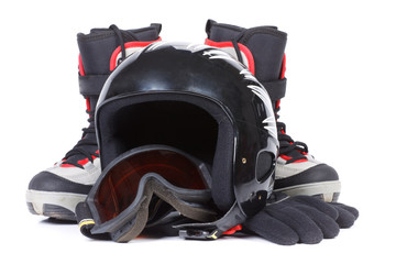 Boots for snowboarding and a protective helmet
