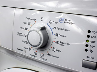 bouton de machine à laver le linge
