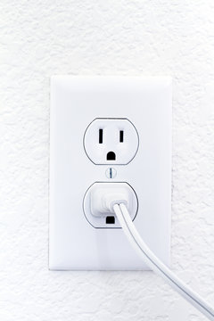 Outlet With Pluged Electric Cord