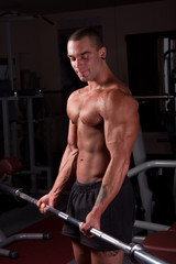 Fototapeta na wymiar Bodybuilder exercising
