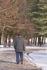 Old man in a winter walk