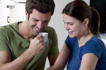 couple having breakfast in the kitchen