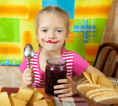 Little Girl Eating Jam