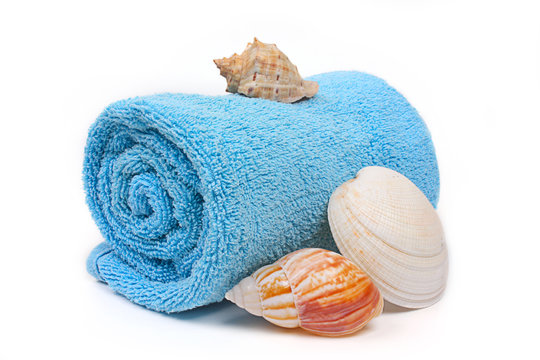 Blue Beach Towel With Seashells On White Background