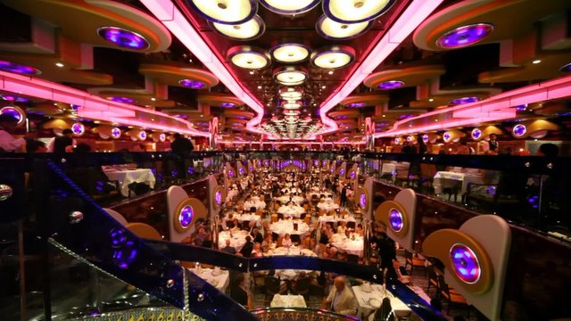 Restaurant with many people inside on cruise liner
