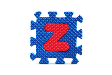 Alphabet puzzle pieces on white background