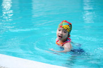 Kid in swimming pool