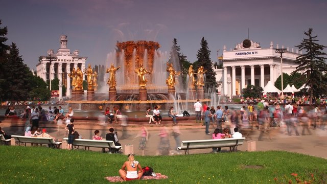 Square with fountain in summer day