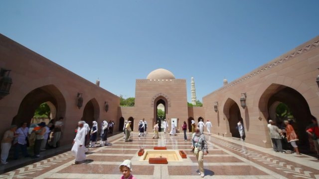mother with children in Sultan Qaboos Grand Mosque, Muscat