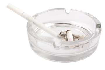 Cigarette on ashtray isolated on white background