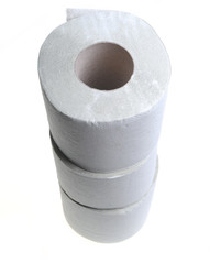 Three rolls of simple grey toilet paper made of waste paper