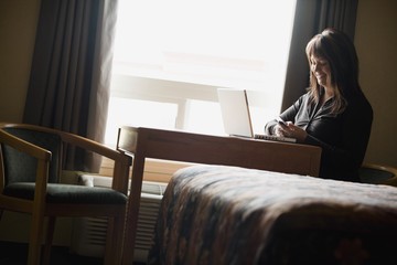 A Woman On A Laptop Computer