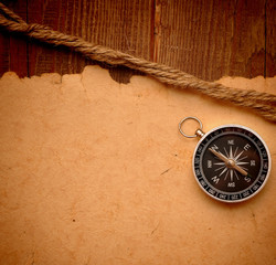 compass and rope on grunge background
